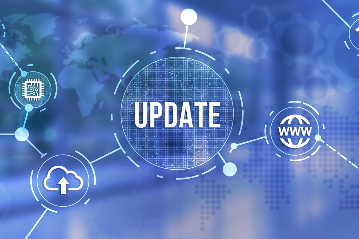 Digitale illustratie van software-updates binnen een verbonden IT- en OT-omgeving, gericht op het beheersen van cybersecurityrisico's door gestructureerd patchmanagement bij Actemium in Nederland.